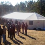 Briefing in front of Western Shelter 23' x 60' tent